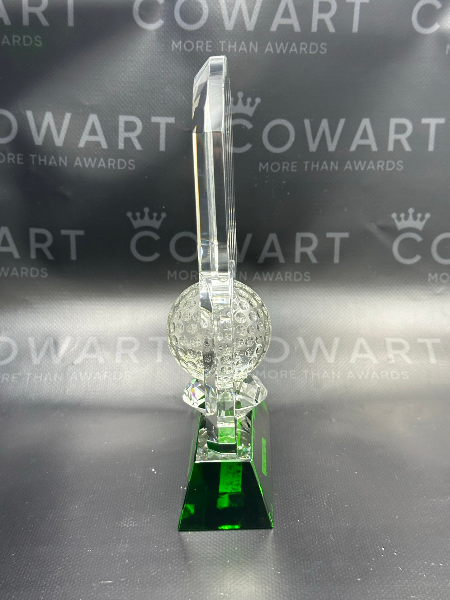 Crystal Golf Ball with Rounded Tower on Green Base